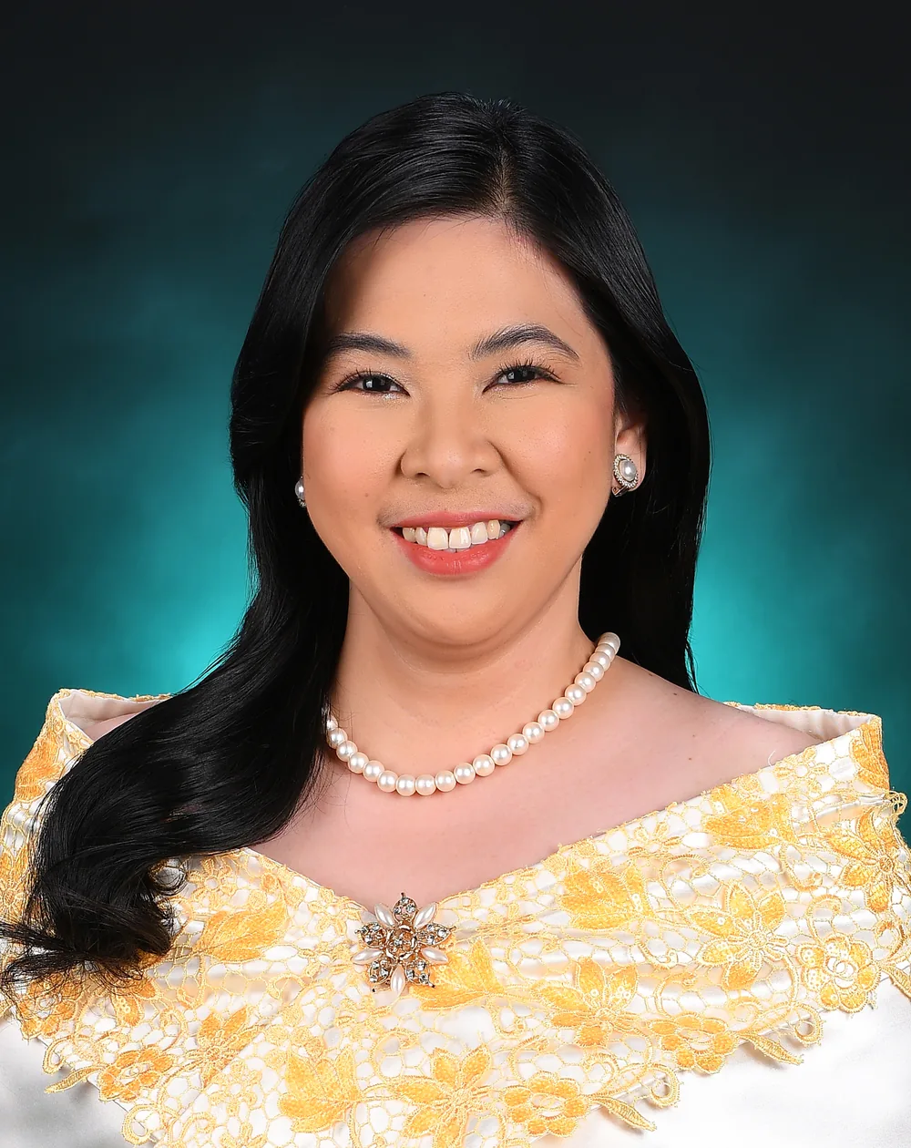 Gillian in a formal graduation portrait